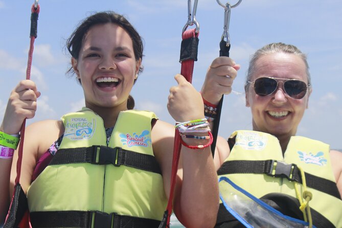 2 in 1 Parasailing and Jet Sky Tour in Cancun - Up in the air: parasailing height, timing, and photo reality