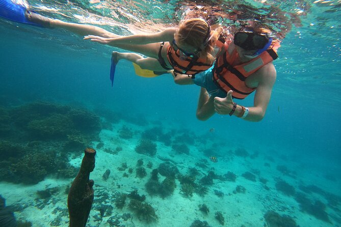 3 Hours VIP Semiprivate Tour Isla Mujeres Full Snorkeling Experience - Stop 1: Lighthouse Reef (the shallow start that builds confidence)