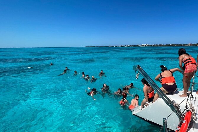 All Inclusive Isla Mujeres Catamaran - The ride back to Cancun: sunset piña colada vibes