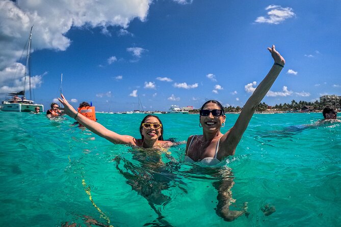 All-Inclusive Isla Mujeres Catamaran with Free Transportation - Isla Mujeres lunch at Zaza or Ice Bar, plus a Blanquizal sandbar swim