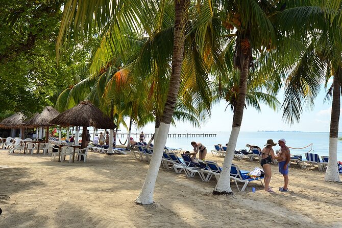 All-Inclusive Isla Mujeres Catamaran with Free Transportation - Downtown Isla Mujeres time: short stroll, tequila tasting included