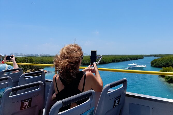 Cancun City Sightseeing and Shopping Tour on a Double Decker bus - Double-decker views versus reality on hot Cancun days