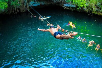 Cancun Combo Tour: ATV and Zip- lines with Cenote Swim - Zip lines over the jungle: safety gear, multiple lines, and real height nerves