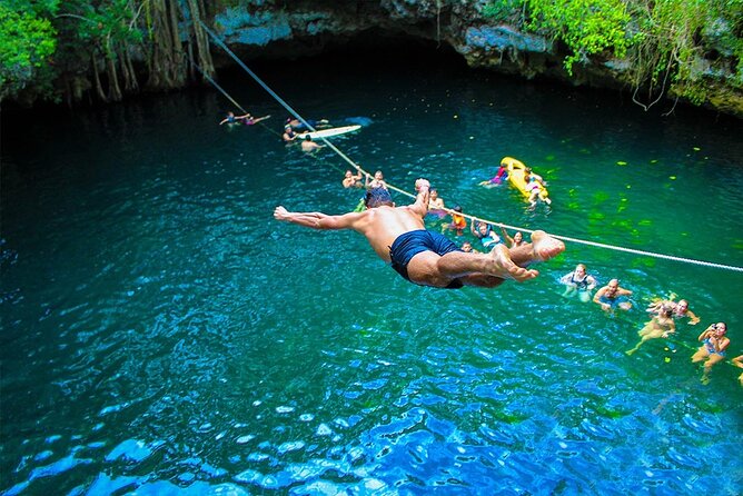Cancun Combo Tour: ATV and Zip- lines with Cenote Swim - Zip lines over the jungle: safety gear, multiple lines, and real height nerves