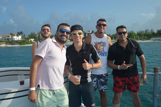 Cancun Dancer Cruise to Isla Mujeres with Snorkeling and Lunch - Life on the catamaran: salsa, slide time, and that open bar rhythm