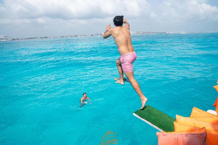 Cancun: Isla Mujeres Full Day Dancer Cruise - Isla Mujeres for Two Hours: Shopping, Beach Views, and Rental Carts