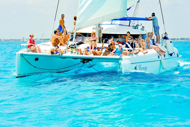 Catamaran to Isla Mujeres Snorkeling Tour with Open Bar and Lunch - Open bar and the Spinnaker-style ride: fun, but manage expectations