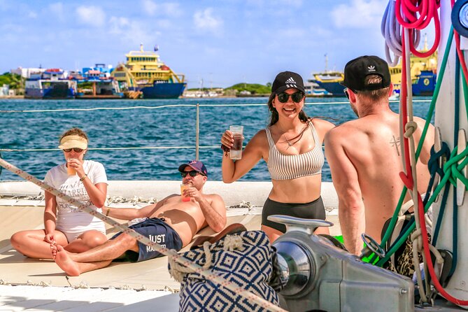 Catamaran to Isla Mujeres Snorkeling Tour with Open Bar and Lunch - Isla Mujeres town walk: souvenirs and a chance to breathe