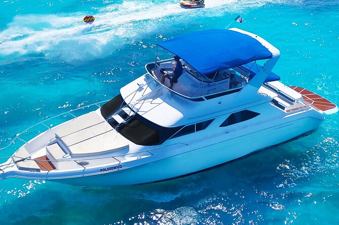 Deluxe Yacht 48FT with FlyBrige Rental in Cancun - On-Board Fun: Snorkelling, Lilly Pad Float, and Paddle Board