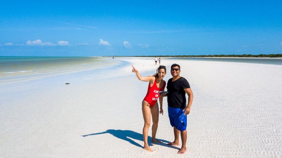 From Cancun or Puerto Morelos: Holbox Boat Tour with Lunch - Yalahau cenote: nature swim time with real boundaries