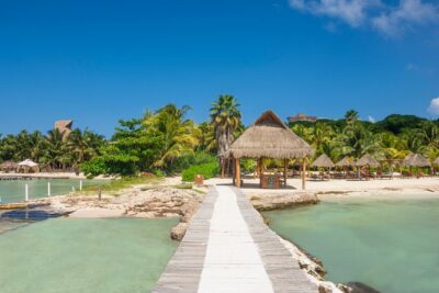 Full-Day Luxurious Catamaran Adventure - Cancún to Isla Mujeres - North Beach at Isla Mujeres: the swim stop and beach club reality check
