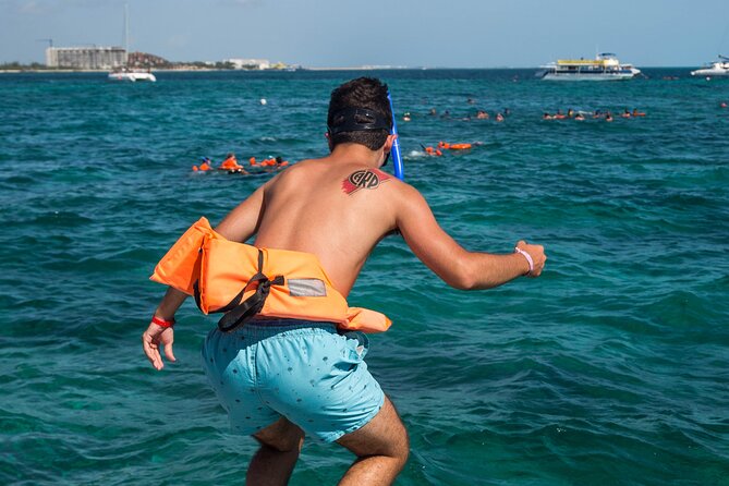 Isla Mujeres Catamaran Tour with Open Bar, Lunch and Snorkeling - Open bar on a catamaran: fun for some, not for everyone