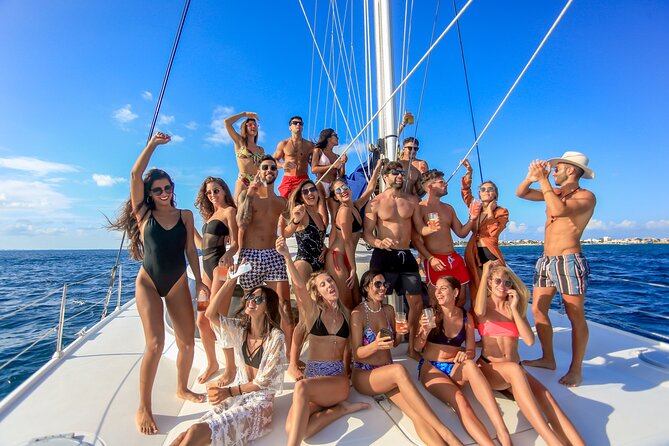 Isla Mujeres Catamaran Tour with Open Bar, Lunch and Snorkeling - Beach club lunch and downtime: where most of the hours go