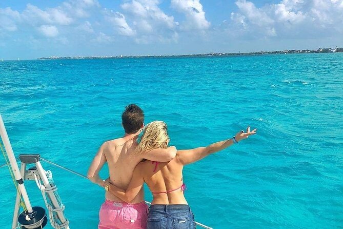 Isla Mujeres Catamaran Tour with Snorkel, Open bar and Transport - Arrecife El Meco snorkeling: what the guided stop is like