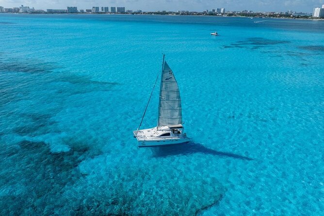 Isla Mujeres Day Tour with Catamaran, Snorkeling & Beach Club - Getting Started: Marina Las Perlas Check-In Without the Headaches