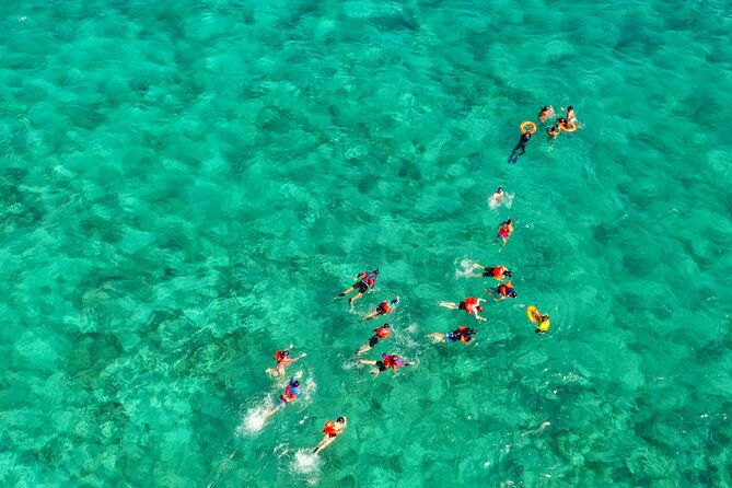 Isla Mujeres Island and Snorkeling Tour - Stop 1 at Punta Sam: breakfast, gear, and the first “ready up”