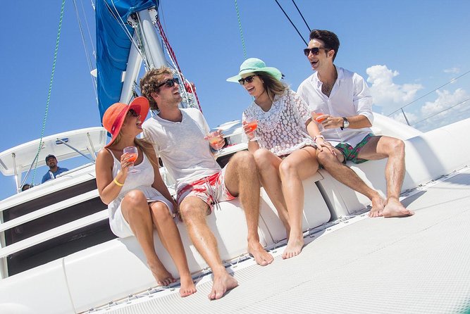 Isla Mujeres Luxury Sailing: Adults Only or Family Friendly - Boarding the Isla Mujeres Luxury Catamaran: Open Bar, Crew, and Group Size