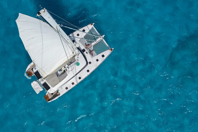 Isla Mujeres Platinum by Albatros Catamarans - AMAZONA Beach Club on Isla Mujeres: lunch, shade, and open-bar cocktails
