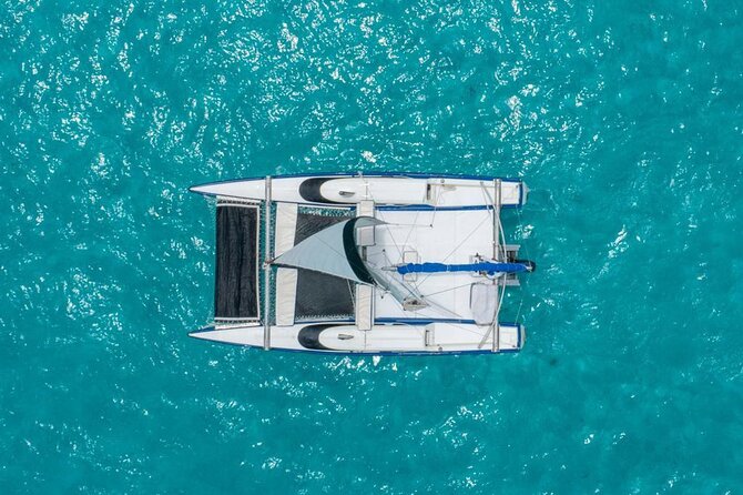 Premium Isla Mujeres Tour by Private Catamaran - The crew matters more than you’d think