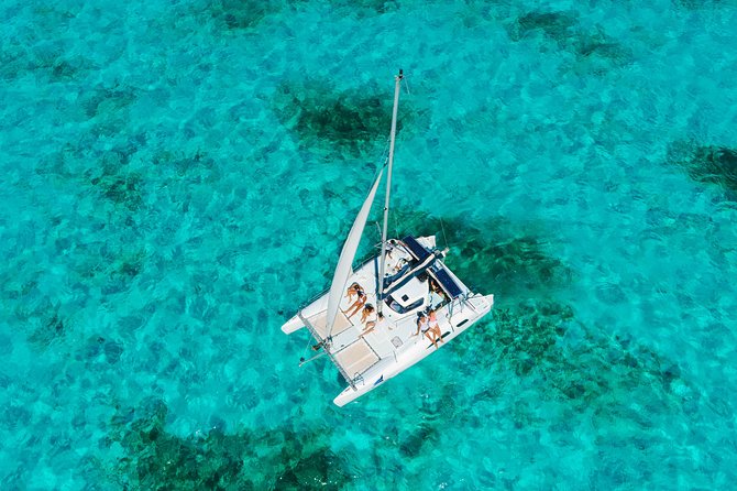 Private Catamaran from Cancun to Isla Mujeres for up to 13 People - Open bar and good crew energy: what unlimited drinks really changes