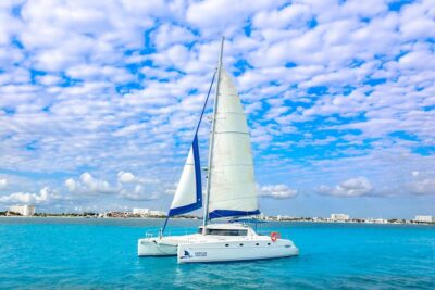 Private Catamaran from Cancun to Isla Mujeres | For up to 30 pp - Your Sailing Day Plan: Snorkel, Sail, Then Playa Norte