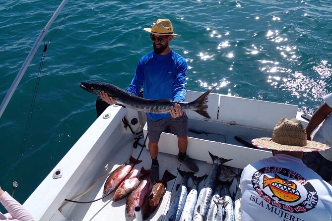 Private fishing charter Bertram 31ft 6 pax max if you don't fish you don't pay - Your own Cancun boat charter, not a shared “fishing cruise”