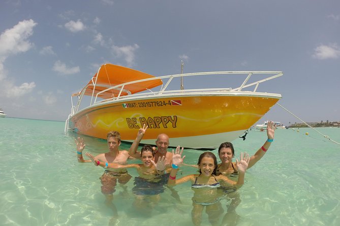 Whale Shark Tour from Cancun, Playa del Carmen, Tulum and Riviera Maya - Playa Norte on Isla Mujeres: lunch, warm shallows, and a calmer end to the day