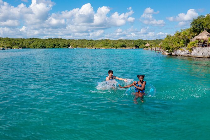 Xel-Ha Tickets with Transportation included - Air and Cliffside Thrills: Bridges, Ropes, and Water Slides